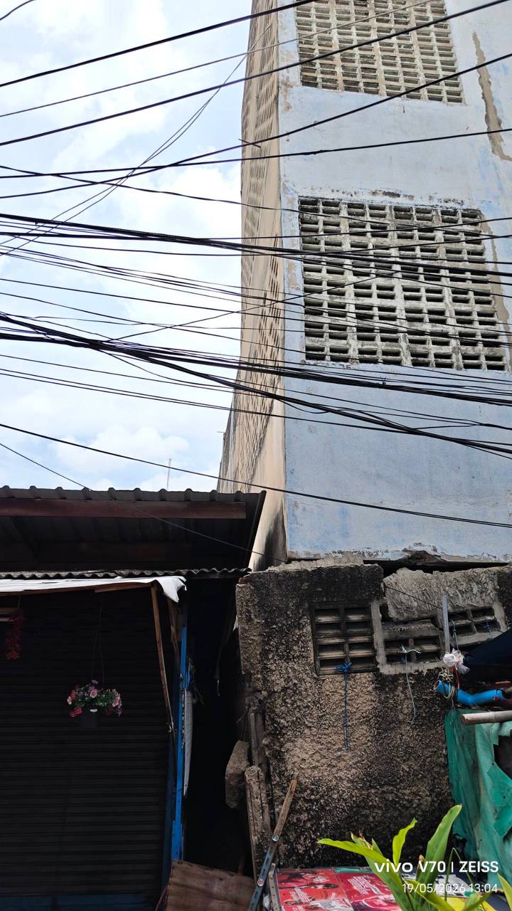 Rear building at WITHIN in a weathered pre-demolition state as internal strip-out begins ahead of clearance for future parking