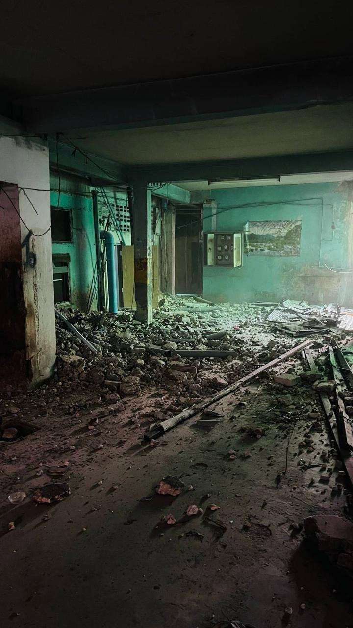 Interior of WITHIN with heavy rubble and broken materials visible during the first day demolition began